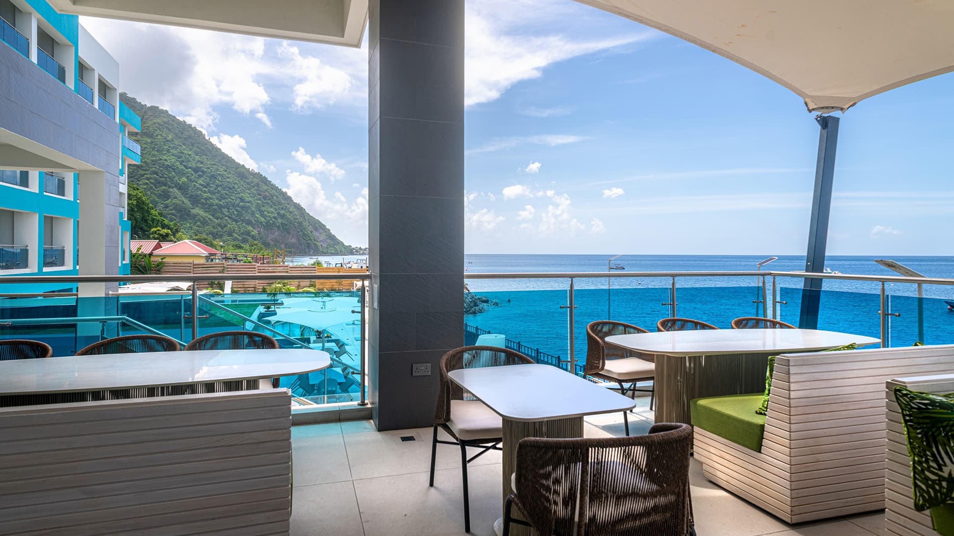 Horizon Bar at Ocean Oasis, overlooking the infinity pool at sunset